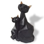 Геометрична скулптура - черни котки